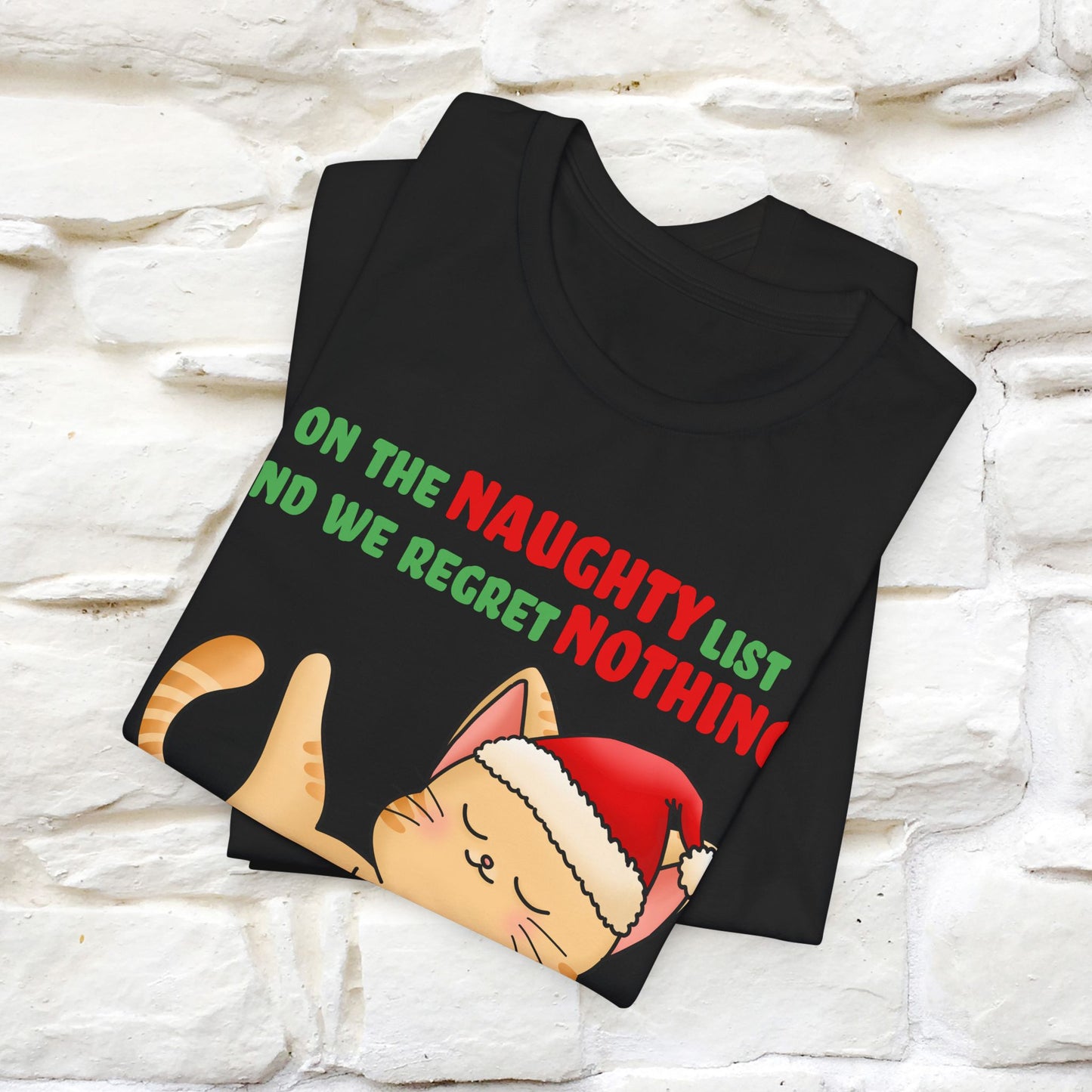 On the Naughty List and We Regret Nothing | Sarcastic Cat Christmas Shirt for Men & Women | 100% Cotton*