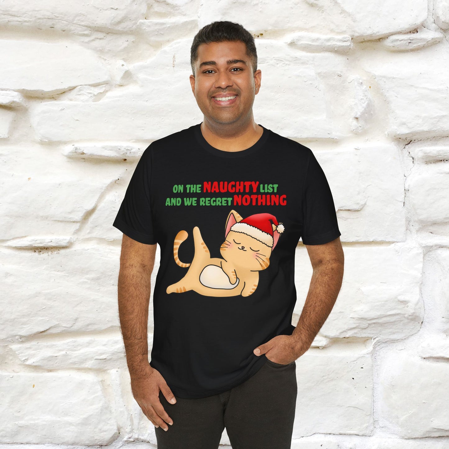 On the Naughty List and We Regret Nothing | Sarcastic Cat Christmas Shirt for Men & Women | 100% Cotton*